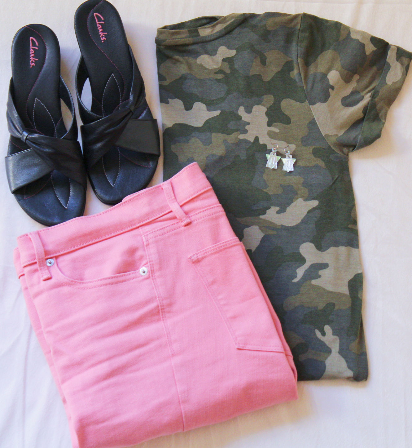 pink shirt camo pants