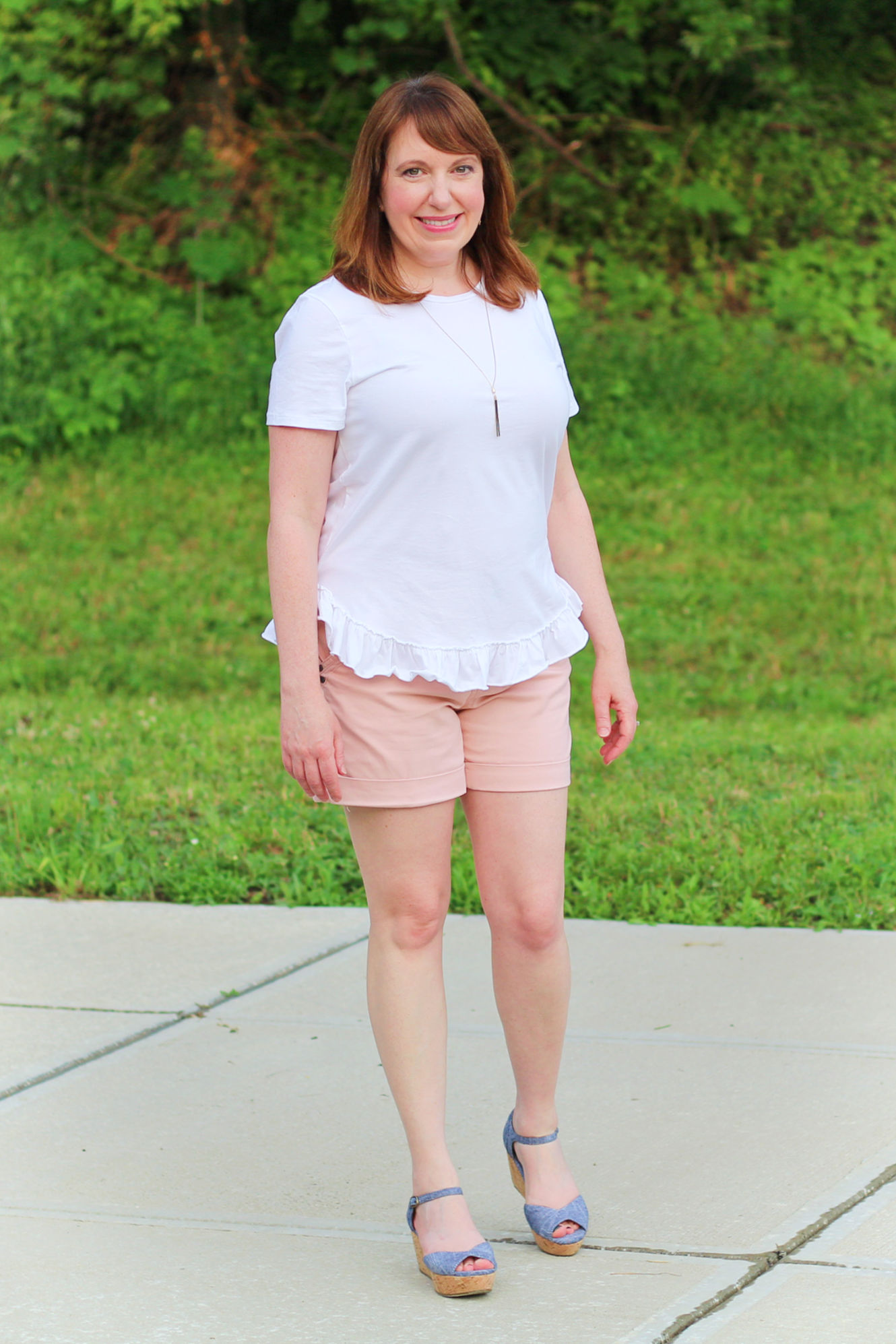 White Peplum Top And Blush Shorts #summeroutfit #over40fashion