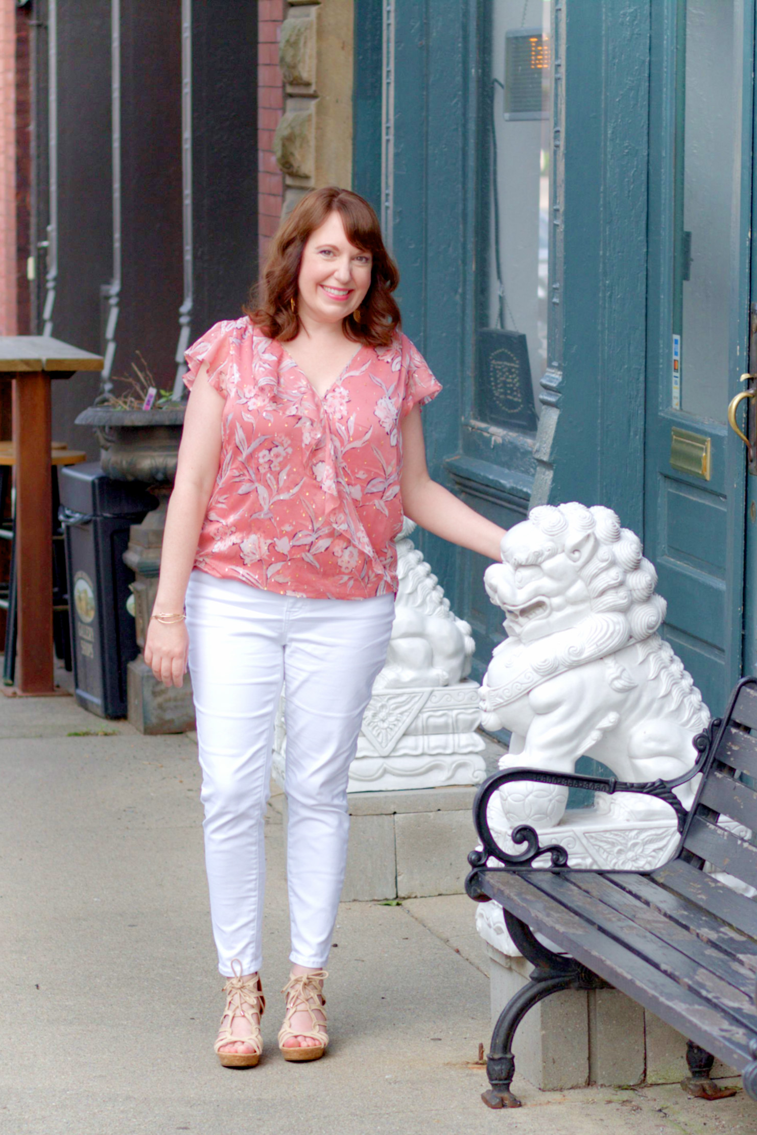 Dianna Looking At Lion Statue