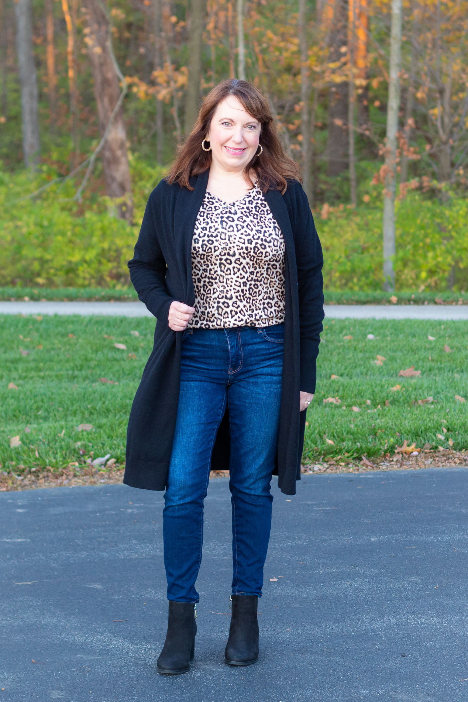 Dianna Wearing Cardigan, Animal Print Top, & Jeans